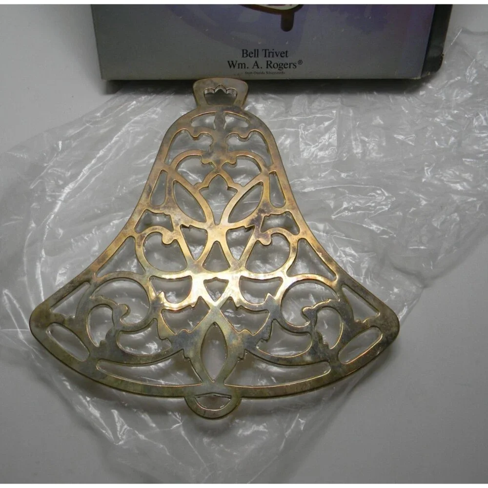 VTG Wm A Rogers Cast Metal Trivet Bell Shape Ornate Kitchen Oneida Made in USA